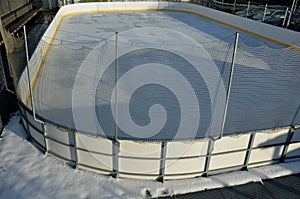 hockey field, outdoor public skating and teaching small children with an