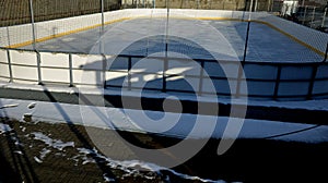 hockey field, outdoor public skating and teaching small children with an