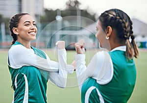 Hockey, fitness and women stretching in team training, practice or sports workout exercise on turf. Teamwork, smile or