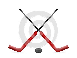 Hockey goalie sticks and puck