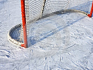 A hockey net at the local outdoor skating rink.