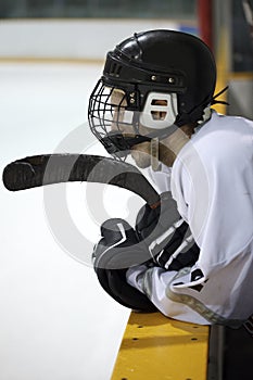 Hockey player on bench