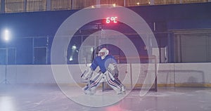 Hockey player carries out an attack on the opponent`s goal and scores a goal in extra time. The player brings victory to