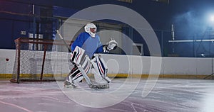 Hockey player carries out an attack on the opponent`s goal and scores a goal in extra time. The player brings victory to