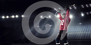 Hockey player on ice . Mixed media