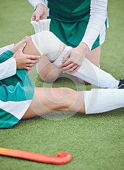 Hockey player, knee pain and injury on field with sports accident, medic help athlete with fitness and health. Wellness