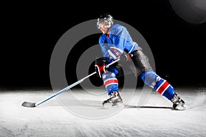 Hockey player turning around skating on ice