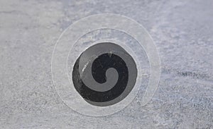 hockey puck on ice