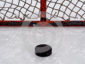 Hockey puck in net