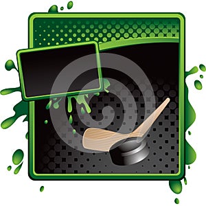 Hockey puck and stick on green and black halftone