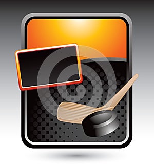 Hockey puck and stick on orange stylized template