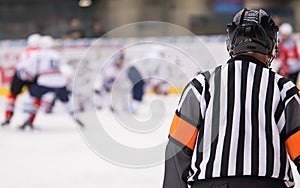 Hockey referee on ice