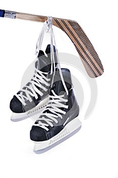 Hockey skates and stick photo