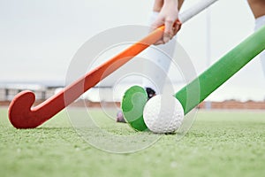 Hockey stick, sports or people on turf in a game, tournament or competition with ball or action. Fitness, athletes