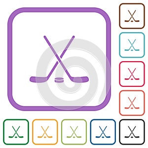 Hockey sticks with puck simple icons