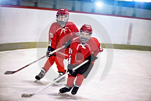 Hockey youth boys players on ice