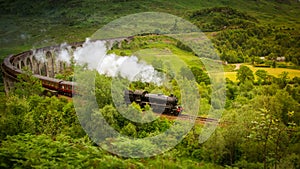 Hogwarts Express steam train from Harry Potter at Glenfinnan Scotland photo