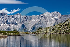 The Hohe Dachstein mountain range with Spiegelsee in the foreground