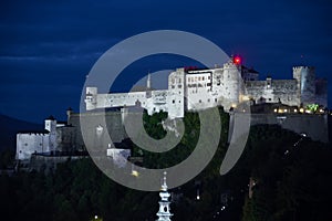 Hohensalzburg fortress at night. Salzburg. Austria photo