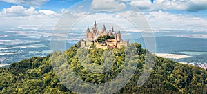 Hohenzollern Castle on mountain top, panoramic view of German burg, Germany