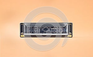 Hohner Rocket professional diatonic harmonica backside.