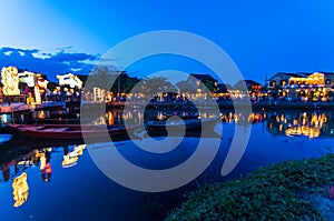 Hoi An city lights across the Thu Bon river in Vietnam