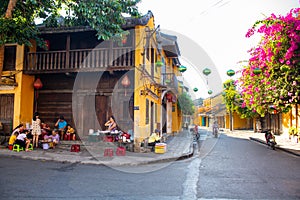 Hoi An, Vietnam- 07/09/2020: Hoi An residents on a street in Hoi An. The World Heritage Site. Daily activities.