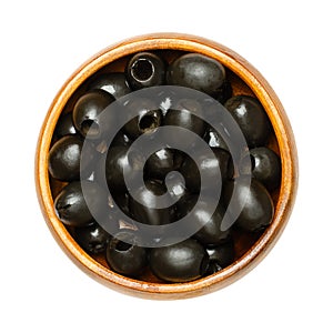 Hojiblanca, pitted black olives, Spanish table olives in wooden bowl