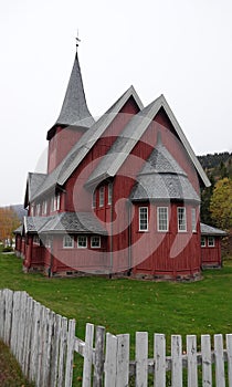 Norwegian red church Hol kyrkje at Hagafoss in Buskerud Norway in autumn photo