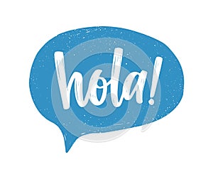 Hola Spanish greeting handwritten with white calligraphic cursive font inside blue speech bubble or balloon. Creative