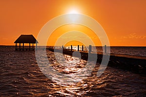 Holbox island sunset beach pier hut Mexico photo