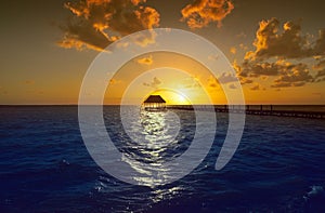 Holbox island sunset beach pier hut Mexico photo