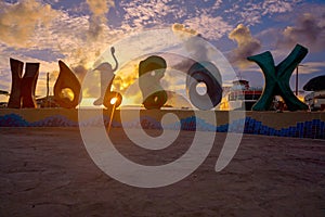 Holbox island word sign spell at sunset Mexico