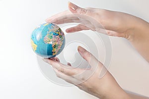 Hold the globe in your hands and protect the planet Earth