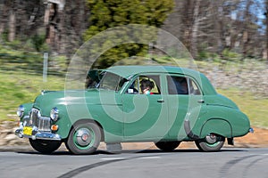 1953 Holden FX driving on country road