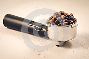 holder filled with coffee beans/holder filled with coffee beans on a concrete background
