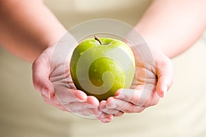 Holding Apple