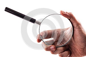 Holding a big magnifying glass contrariwise