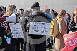 Holding Billboards At The Niet Mijn Schuld Demonstration At Amsterdam The Netherlands 5-2-2022