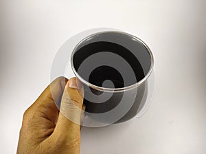 Holding a black mug on white 4