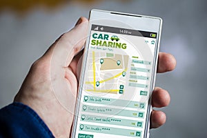 holding car sharing smartphone