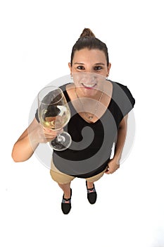 Holding a coup of white wine on white background