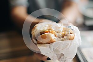 Holding delicious Chicken burger