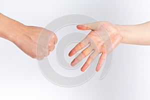 Holding guessing fist gesture in front of the white background
