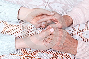 Holding hand. Home care elderly concept.