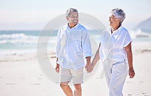 Holding hands, beach or happy old couple walking in summer with happiness, trust or romance. Lovers, smile or senior man