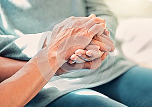 Holding hands, care and caregiver with senior woman for support and trust in a nursing home for people in retirement