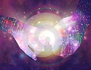 Holding hands, cosmic unity, twin flames, magical love healing energy from hands universe background