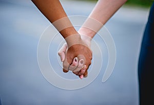 Holding hands with each other is an expression of love. Love concept