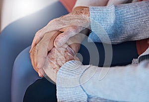 Holding hands, love and support in trust for elderly care, retirement or hope and respect at old age home. Senior hands